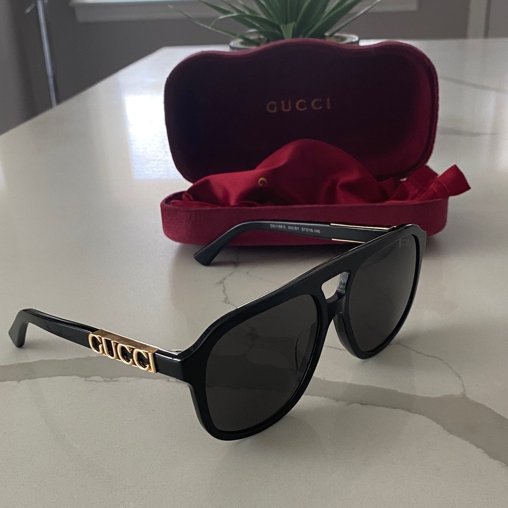 Gucci Men's Sunglasses with Black Frame and Gold Detailing